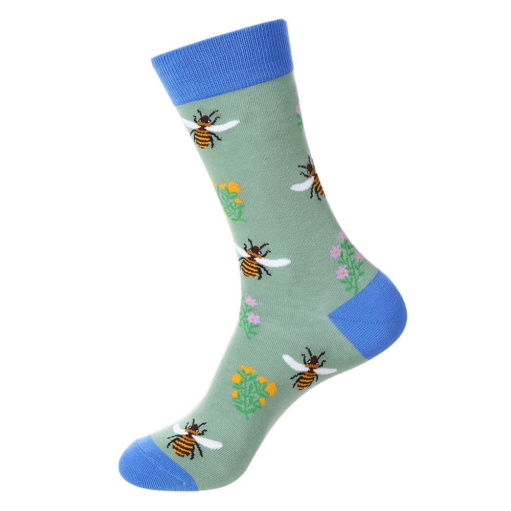 Spring-themed socks featuring bees and flowers on a pastel green background with blue accents, unisex crew socks