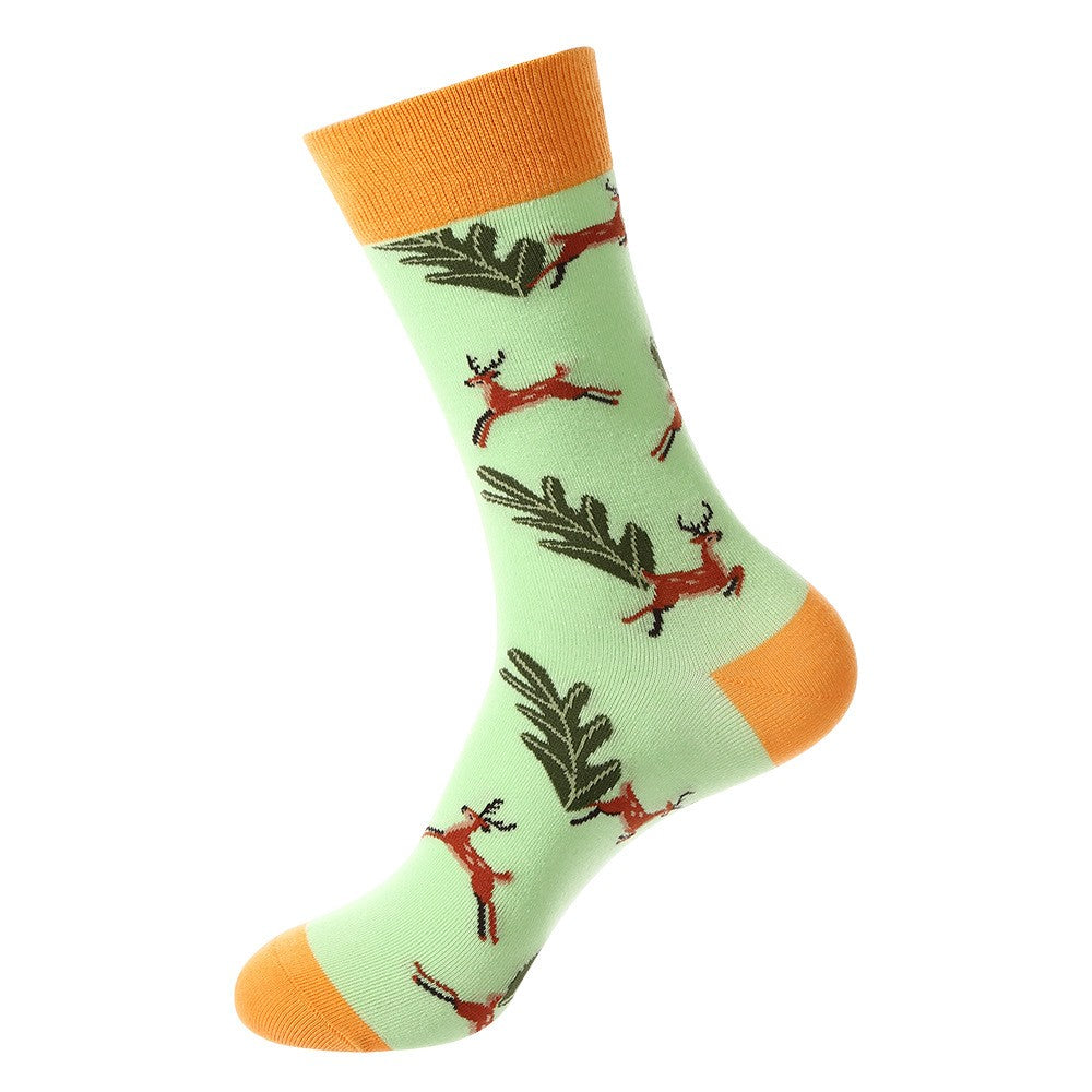Animal-themed crew socks featuring brown jumping deer and green forest leaves on a mint green background with orange cuff, heel, and toe accents, unisex socks