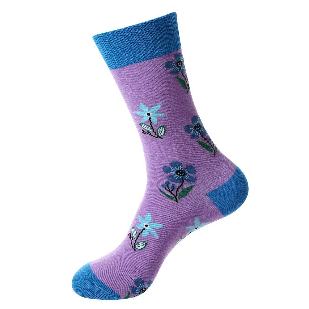 Purple floral crew socks featuring blue wildflowers and green stems, blue cuff, heel, and toe accents, unisex socks