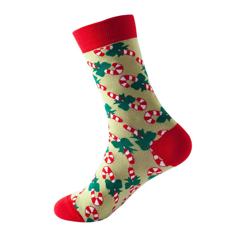 Light yellow crew socks with red candy cane and green holly leaf pattern, red toe, heel, and cuff
