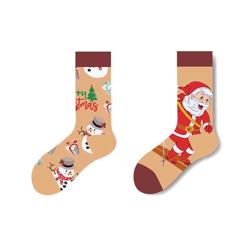Mismatched Christmas socks with Santa climbing on one and snowmen with gifts and festive print on the other β beige crew socks for unisex wear