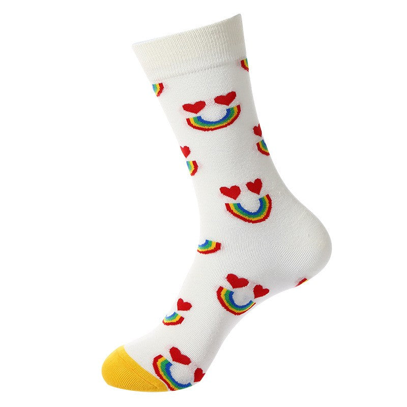 White Valentine’s crew socks with rainbow smiley faces and heart details, yellow toe accent