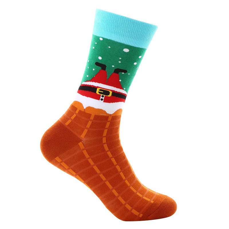 Orange and green crew socks with Santa stuck in chimney design, snowy sky, and light blue cuff