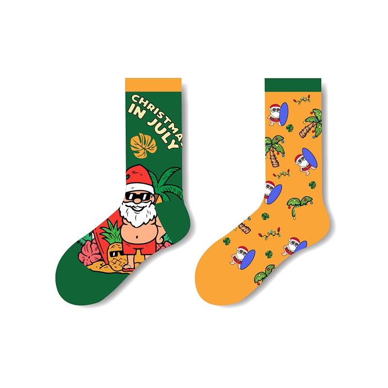 Mismatched tropical Christmas socks with Santa in sunglasses and surfboards β fun unisex crew socks in green and orange design