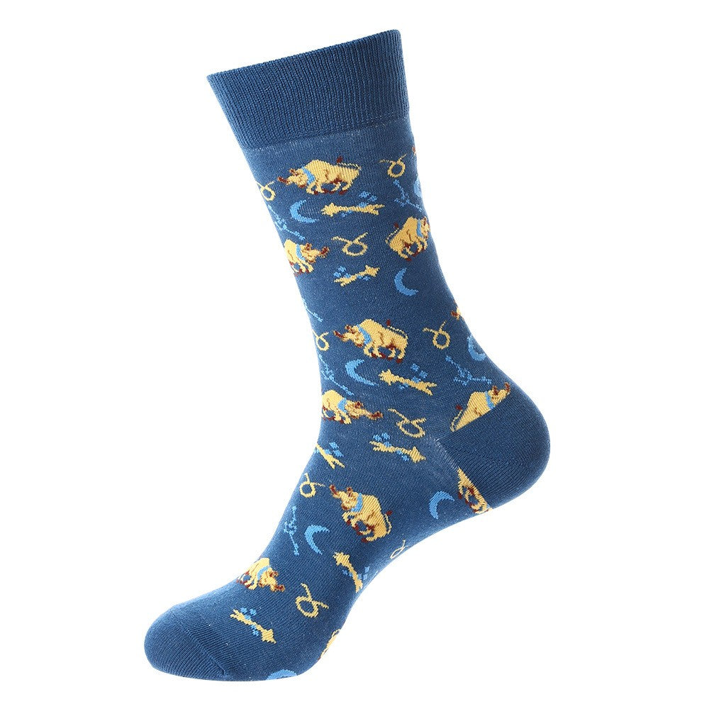 Blue crew sock with golden bull designs, crescent moons, arrows, and Taurus zodiac constellation pattern