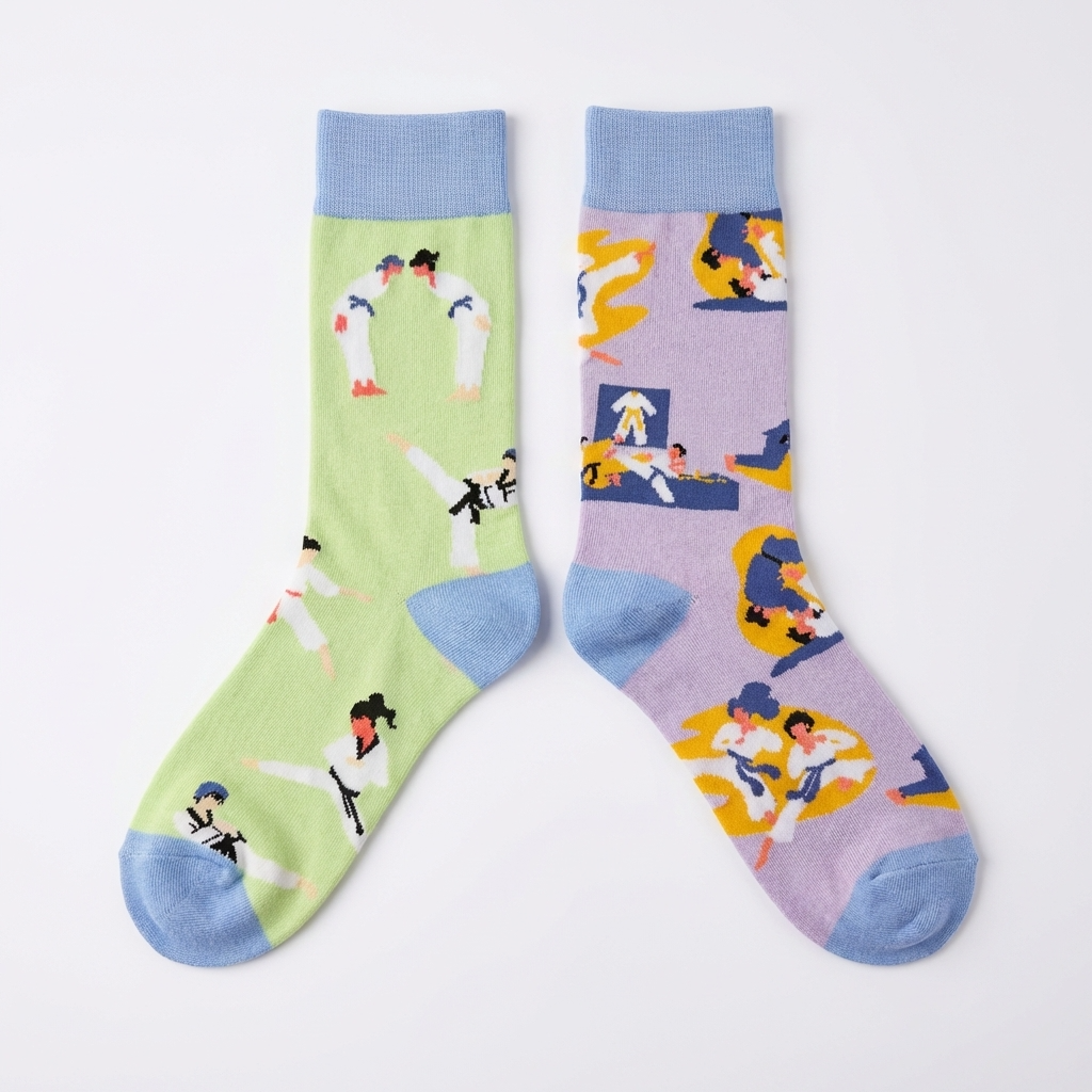 Two socks with colorful designs on a light gray background