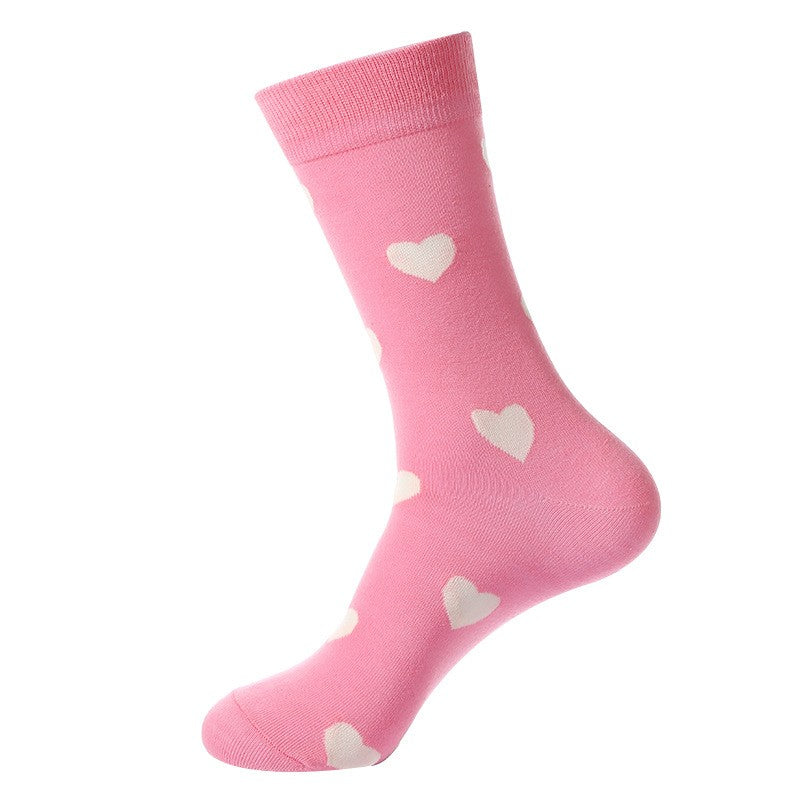 Pink sock with white heart patterns