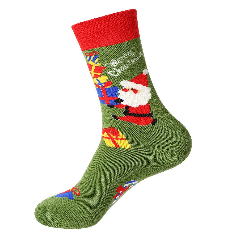 Green Christmas socks with Santa holding presents and βMerry Christmasβ text β festive unisex holiday crew socks