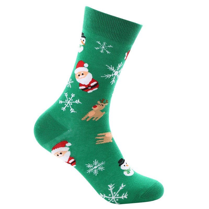 Green Christmas-themed sock with Santa Claus, reindeer, and snowflakes on a white background