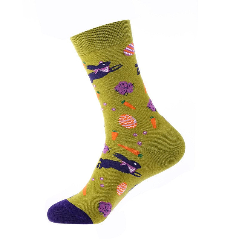 Spring-green crew sock with purple bunnies, carrots and patterned eggs, purple toe — animal themed