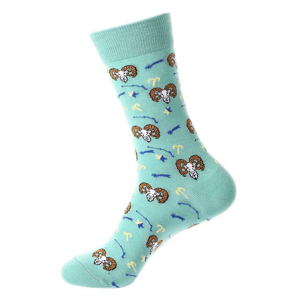 Light blue crew sock with Aries ram heads, constellation arrows, and zodiac star patterns — constellation themed