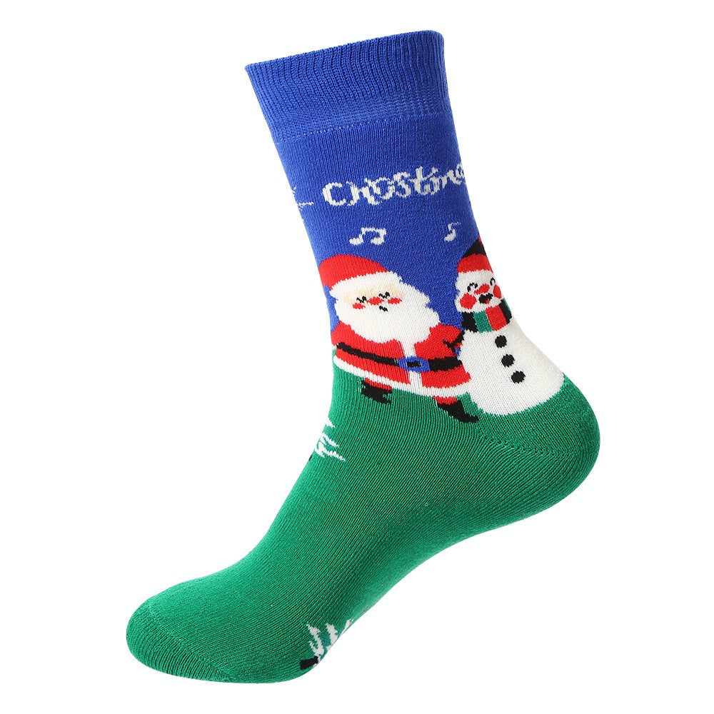 Blue and green Christmas socks with Santa, snowman, and music notes – unisex holiday crew socks
