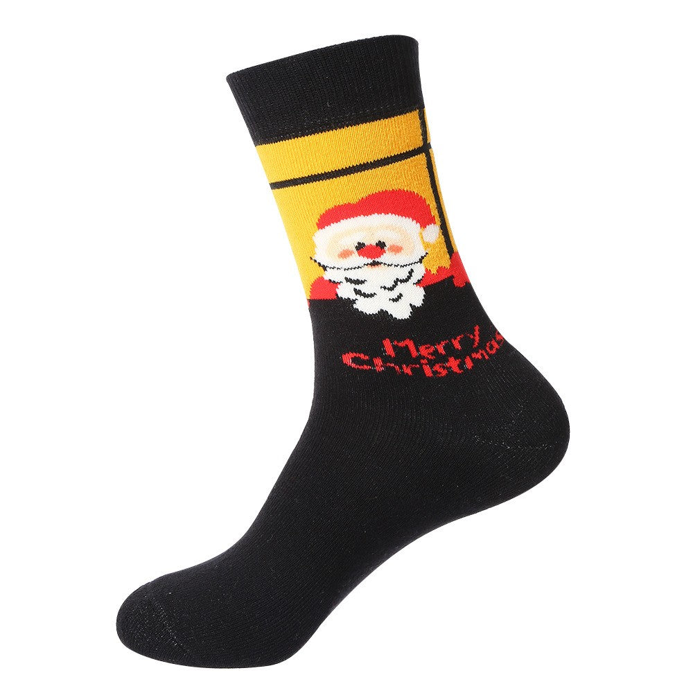 Black crew socks with Santa peeking from a window and “Merry Christmas” text – unisex Christmas socks