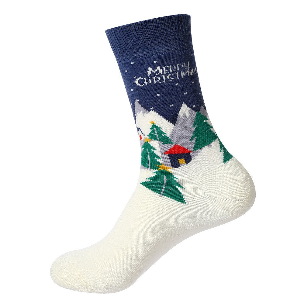 White crew socks with a winter cabin, pine trees, and snowy mountains – unisex Christmas socks